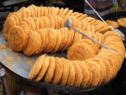 A bunch of nest-like threaded food having golden brown color