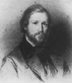 Portrait of a bearded man in his early 20s, with combed hair
