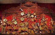Durga Puja is a multi-day festival in Eastern India that features elaborate temple and stage decorations (pandals), scripture recitation, performance arts, revelry, and processions.[77]
