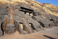 General view, with the top of the chaitya entrance columns visible, and the outside stupa