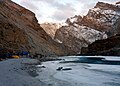 First night camp on a sandy beach opposite Bakulo cave