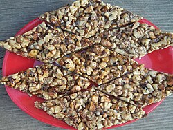 Georgian snack Gozinaki made from roasted walnuts and honey