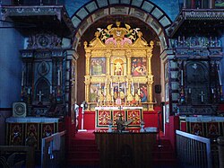 Altar of the St Mary's Church in Kottayam flanked by two St Thomas crosses from the 7th century AD on either side. The crosses pre-date the church which was built in 1550&nbsp;AD.