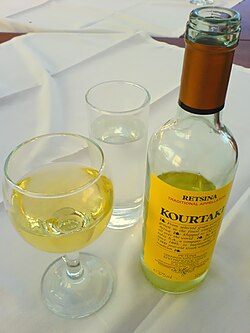 A bottle of retsina, a Greek wine flavoured with Pinus halepensis resin