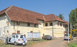 A building with cars parked in front