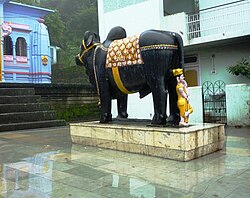 Nandi - Shiva's bull in front of Hindu temple, Rewalsar, HP, India