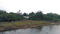 Vedhapureshwar temple at bank of cheyyar river.jpg