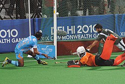 XIX Commonwealth Games-2010 Delhi Hockey (Men`s) Saravanjit Singh of India scoring a goal against Pakistan, at Dhayan Chand National Stadium, in New Delhi on October 10 2010.jpg