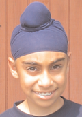 A Sikh boy wearing a patka
