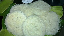 A bunch of nest-like threaded food having whitish color