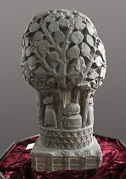 A pillar capital shaped as a Kalpadruma tree, also found nearby at Besnagar, probably associated with Lakshmi.[53][55] Indian Museum, Kolkata.[65]