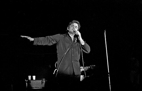 Country-western singer Johnny Cash called himself "the man in black". Image of his performance in Bremen, Northern Germany, in September 1972.