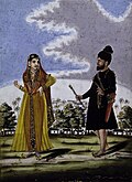 A Sikh Nihang and Nihang Singhani both traditional Sikh warriors.