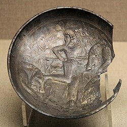A probable Kushano-Sasanian plate with hunting scene, found in the 504 CE tomb of Feng Hetu in China. Shanxi Museum. It is dated the 3rd-4th century CE, and was probably manufactured in northern Afghanistan.[17][18][19]