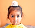 A Sikh boy wearing a rumāl