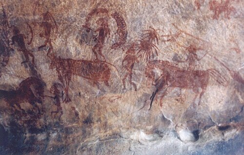 people hunting animal