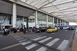 Curbside passenger pick up area at Terminal 3 Cairo International Airport, Egypt