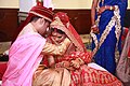 The sacred ceremony of tying the mangala sutra, in a North Indian wedding.