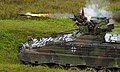 A Bundeswehr Marder infantry fighting vehicle fires a MILAN.
