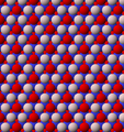 View of trioctahedral sheet structure of mica. The binding sites for apical oxygen are shown as white spheres.
