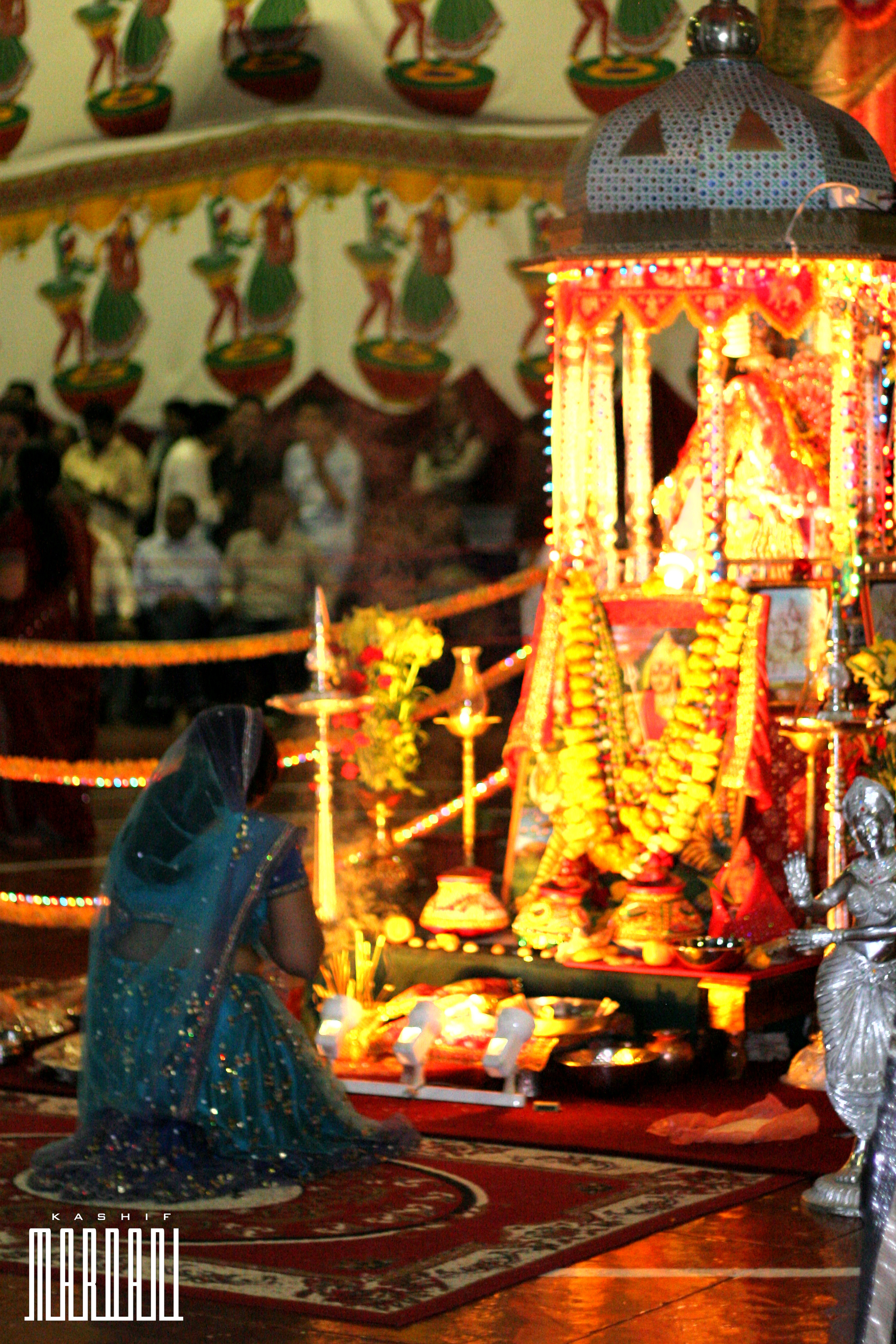 Mozambique Hindu inside a temple offering prayers.jpg